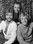 28-11-1975 Bee Gees, Barry, Maurice and Robin Gibb at Memphis Hotel in Amsterdam.

[keywords]Black & White Image:, Posed, Half Length, Eyecontact, Smiling[/keywords]